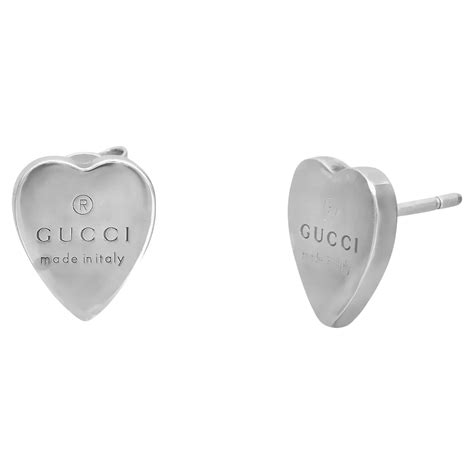 gucci sterling silver trademark heart earrings|gucci interlocking g hoop earrings.